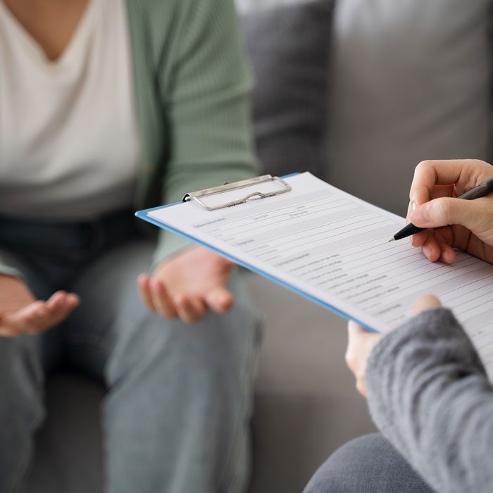 Mental Health Professional Reviewing A Personalized Depression Treatment Plan With A Patient